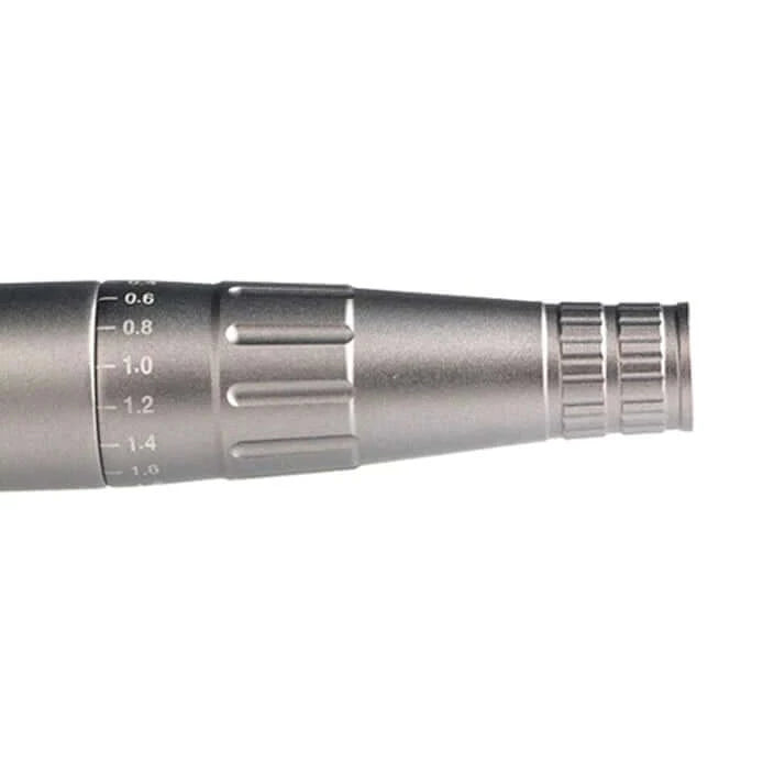 Close-up of Artmex V6 Permanent Makeup Eyebrow Tattoo Machine's tip with adjustable needle length, ensuring precision for beauty aesthetics.