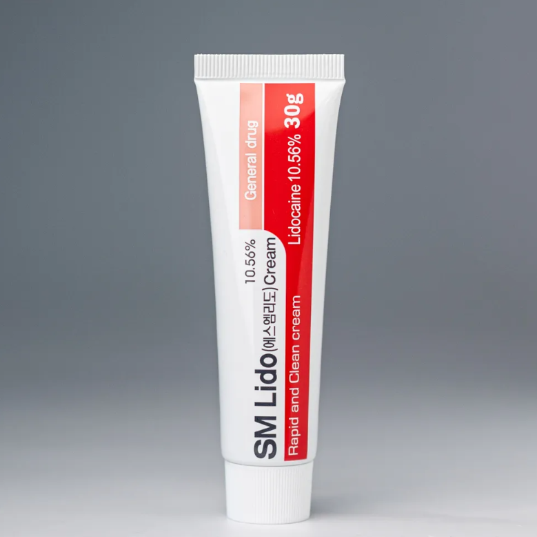A tube of SM Lido 10.56% 30g Numbing Cream with red and white labeling.