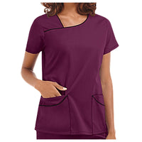 Short sleeve V-neck beauty spa uniform in deep burgundy, featuring practical front pockets for aesthetics professionals.