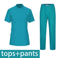 Teal short sleeve beauty salon top and pants set, ideal for aesthetics professionals looking for stylish, breathable workwear.