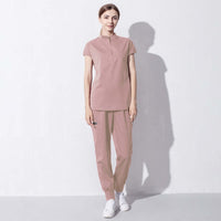Fashionable women's salon workwear showcasing modern design and comfort for the beauty aesthetics professional