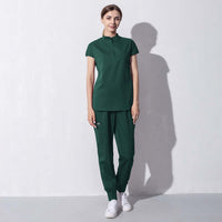 Fashion women salon workwear ensemble in dark green, designed for beauty aesthetics, featuring stylish and comfortable professional attire.