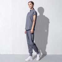 Fashion women salon workwear in grey, designed for beauty aesthetics, enhancing style and comfort for professional salon environments.