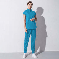 Fashionable blue salon workwear for women, emphasizing beauty aesthetics and professionalism